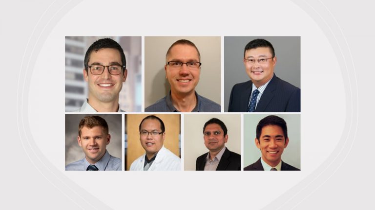 Collage of seven professional headshots of Truveta team members arranged in two rows, each smiling and dressed in business or clinical attire against varied backdrops.