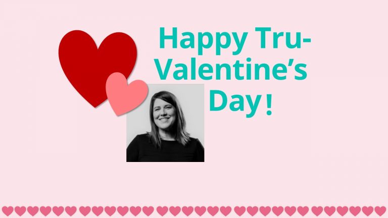 Valentine’s Day graphic with large red and pink hearts, teal text reading “Happy Tru-Valentine’s Day!”, and a black-and-white photo of a smiling woman.